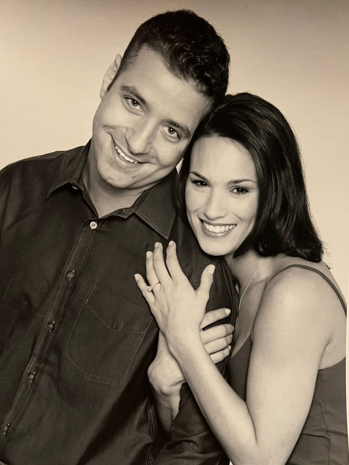 Engagement portrait, ring on her hand
