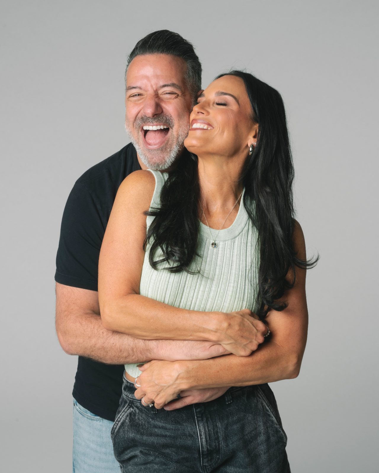 Marc and Heidi laughing, studio portrait