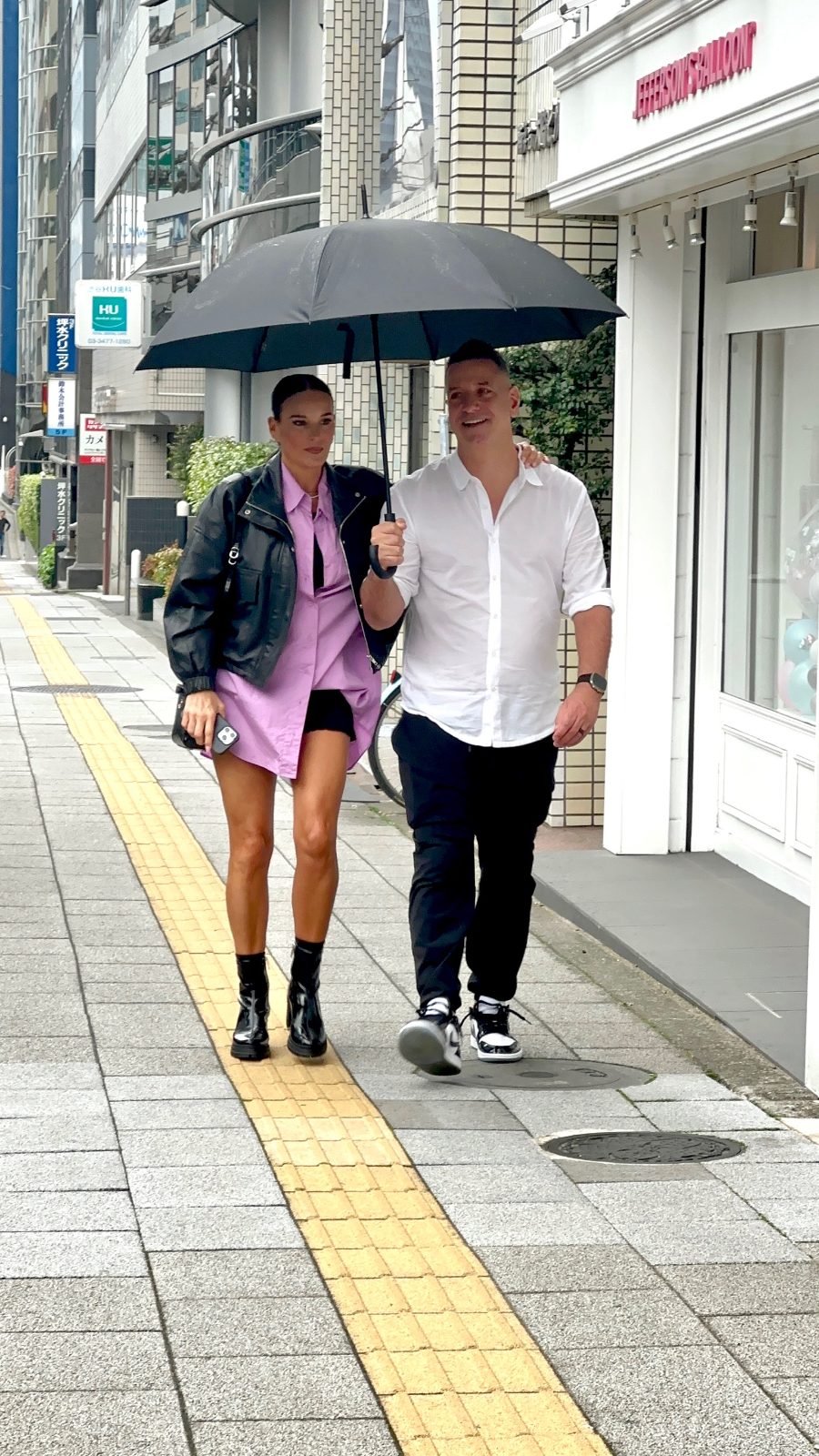 Walking under one umbrella